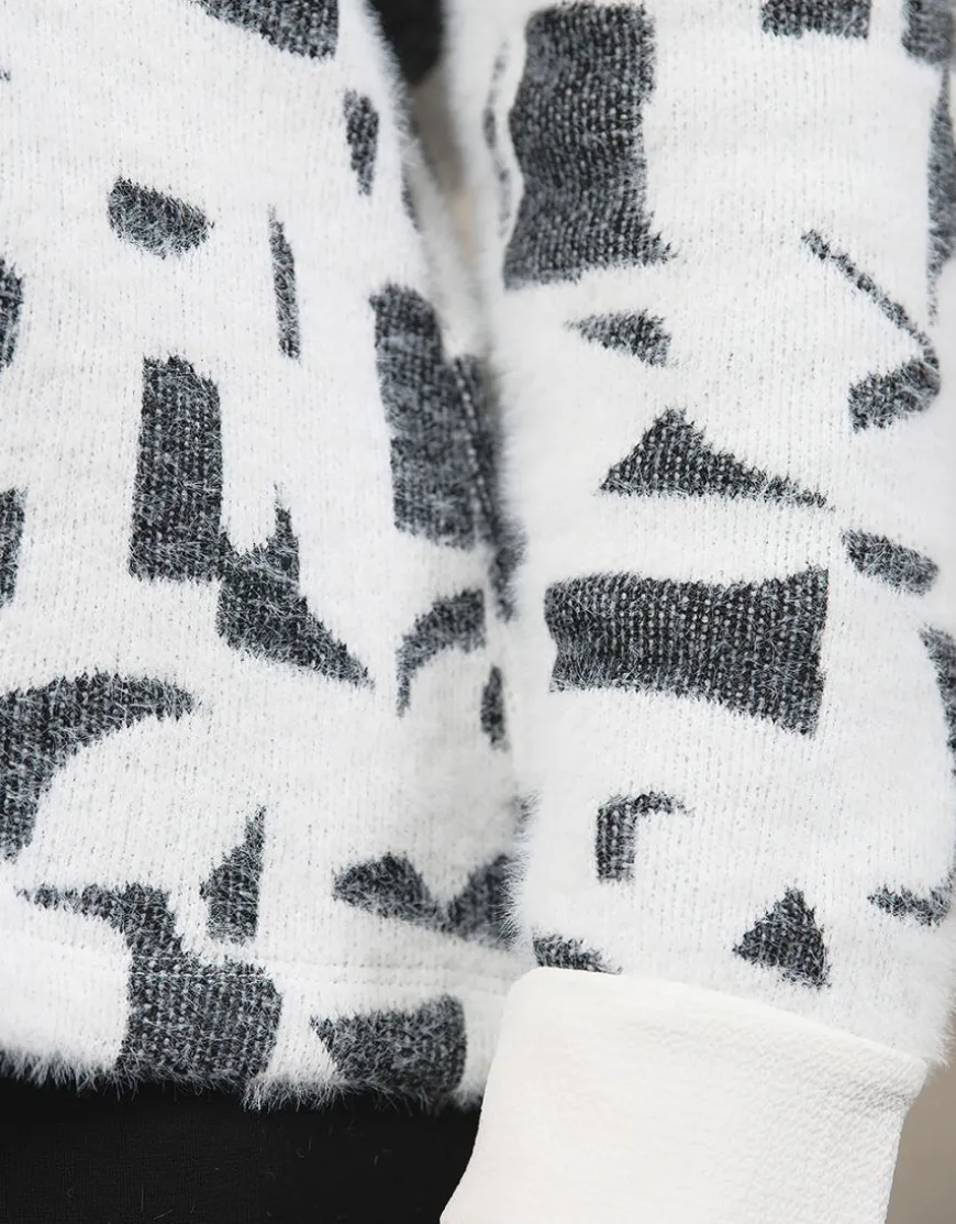 Pull chemisier noir blanc