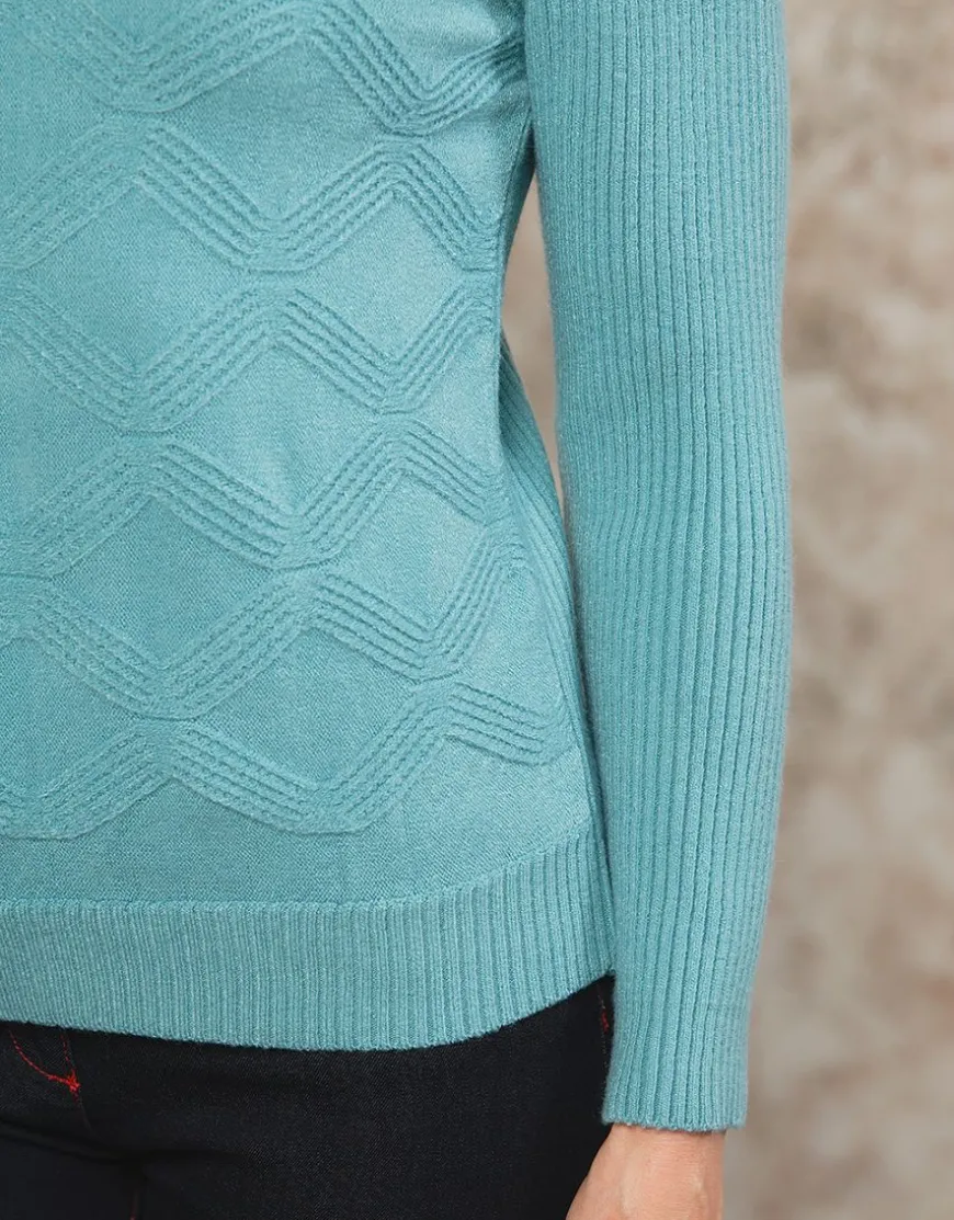 Pull torsadé bleu